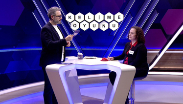 Zarf hâliyle sözün kısası anlamlarına gelen kelime